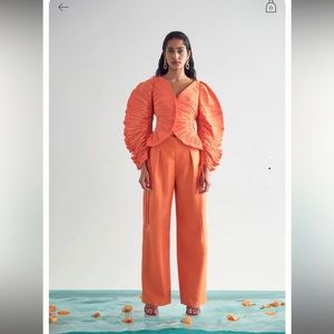 Beautiful orange top with tag. Size large. Can be used for many occasions